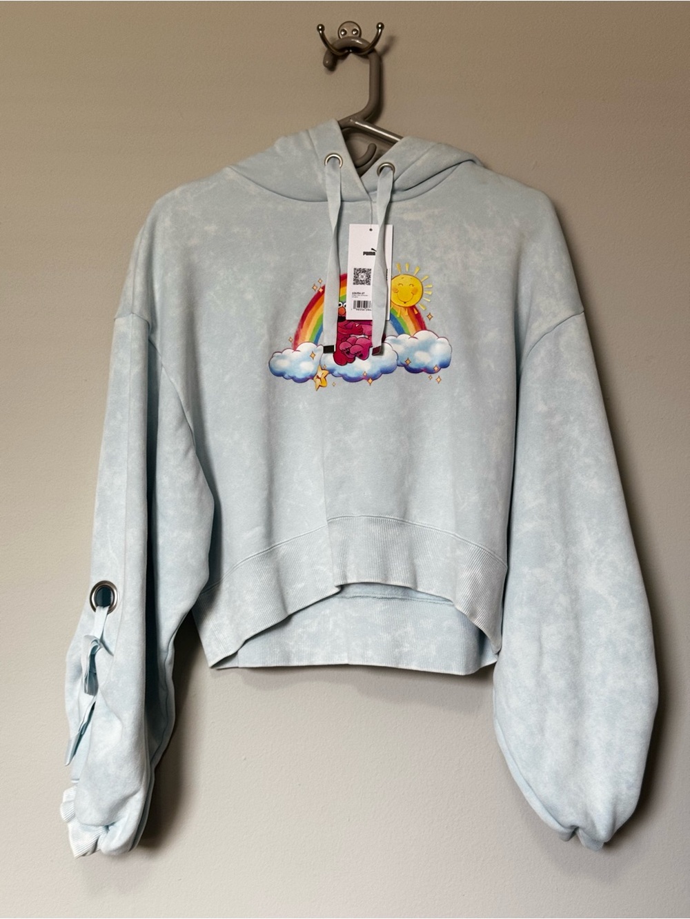 Puma Light Blue Cropped Hoodie with Rainbow & Sun Graphic